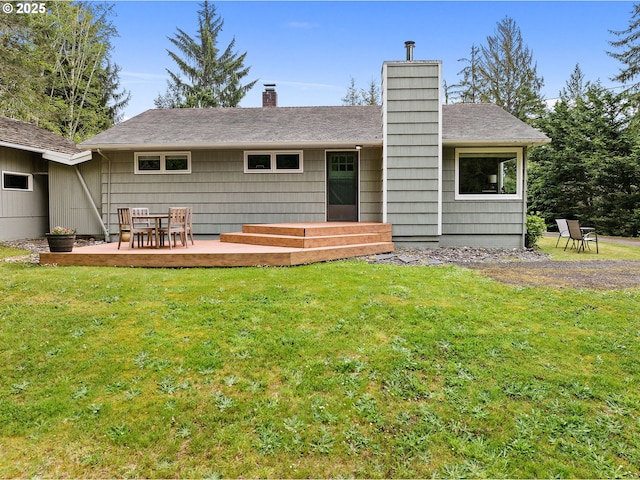 92757 Claremont Rd, Astoria, OR 97103 - back of property with a chimney, a yard, a patio, and roof with shingles