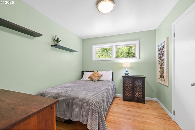 92757 Claremont Rd, Astoria, OR 97103 - bedroom featuring wood finished floors