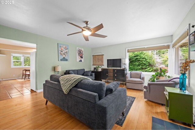 92757 Claremont Rd, Astoria, OR 97103 - living area featuring light wood-style flooring and a ceiling fan