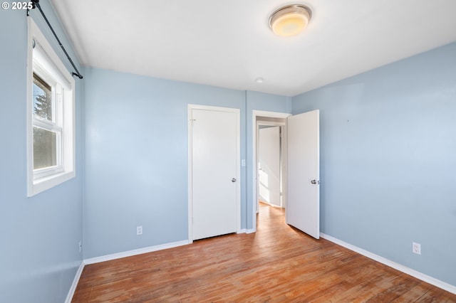 unfurnished bedroom featuring light hardwood / wood-style flooring