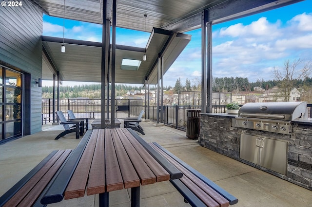 view of patio / terrace with exterior kitchen and grilling area