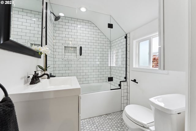 bathroom featuring toilet, vanity, bath / shower combo with glass door, tile patterned floors, and recessed lighting