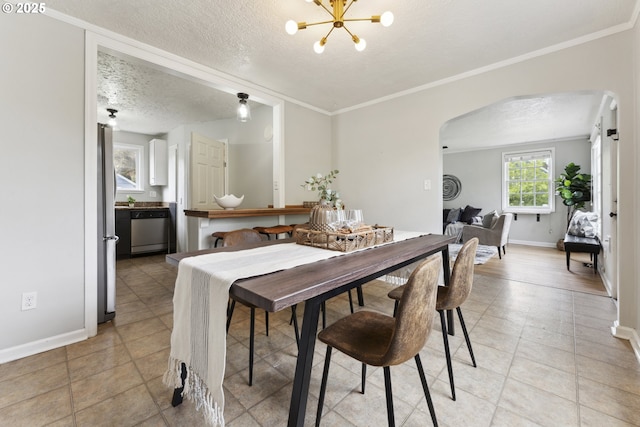dining room featuring arched walkways, a textured ceiling, a chandelier, baseboards, and light tile patterned floors
