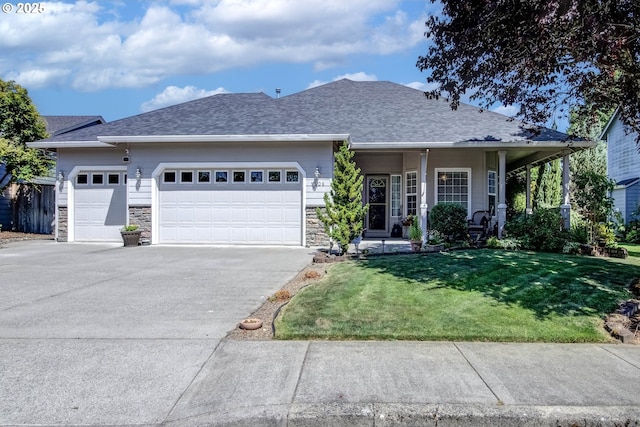 1506 E Heritage Loop, La Center, WA 98629 - single story home featuring a garage, a front yard, driveway, stone siding, and roof with shingles
