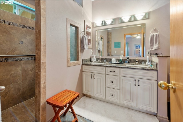 1506 E Heritage Loop, La Center, WA 98629 - full bathroom featuring a walk in shower, double vanity, and a textured wall