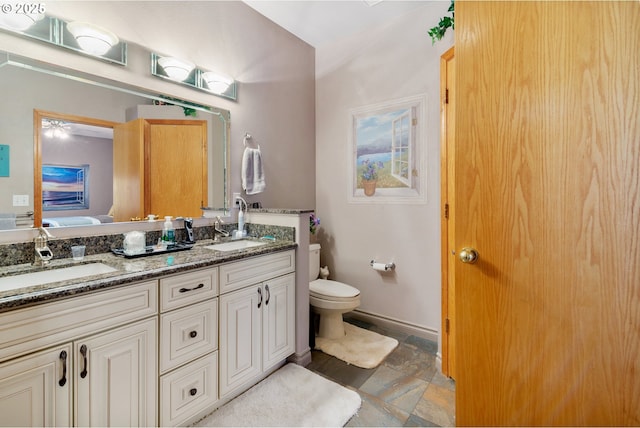 1506 E Heritage Loop, La Center, WA 98629 - full bathroom with double vanity and stone tile floors