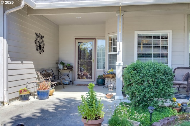 1506 E Heritage Loop, La Center, WA 98629 - doorway to property with a porch