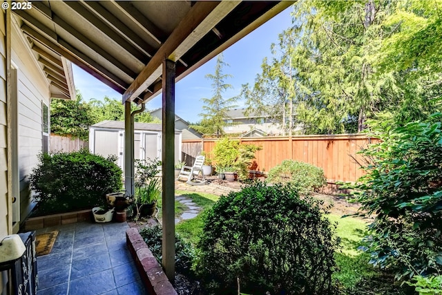 1506 E Heritage Loop, La Center, WA 98629 - fenced backyard with a storage shed and a patio