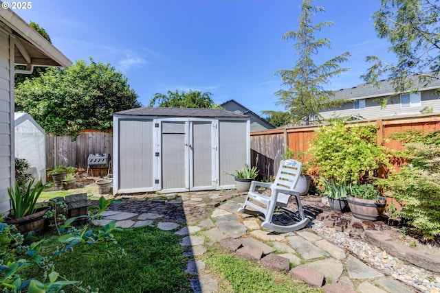 1506 E Heritage Loop, La Center, WA 98629 - view of shed with a fenced backyard