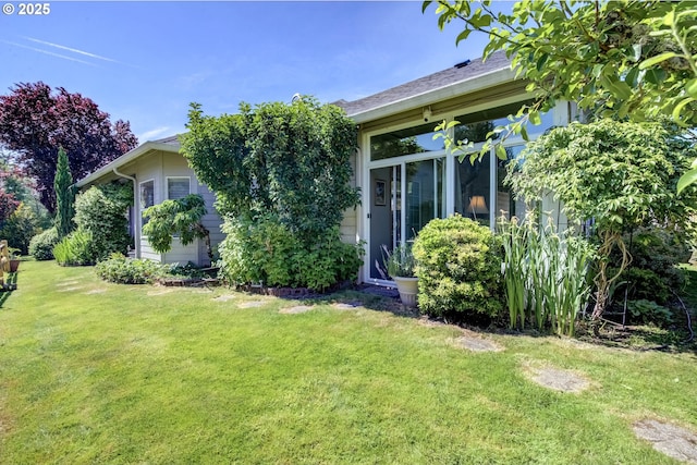 1506 E Heritage Loop, La Center, WA 98629 - rear view of house featuring a yard