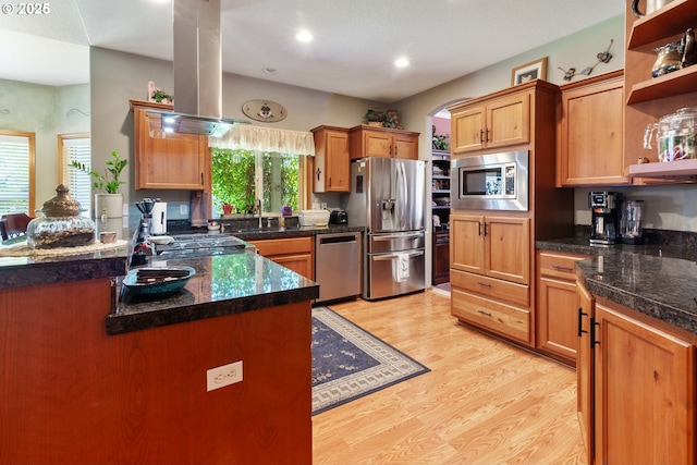 1506 E Heritage Loop, La Center, WA 98629 - kitchen featuring appliances with stainless steel finishes, open shelves, light wood-type flooring, recessed lighting, and island exhaust hood