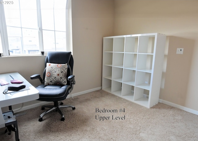 office space with carpet flooring and baseboards