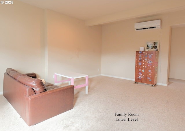 living area with baseboards, a wall mounted air conditioner, and carpet