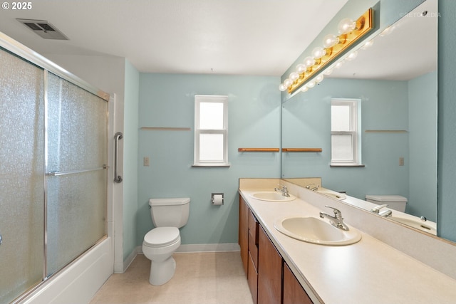 5312 SW Erickson Ave, Beaverton, OR 97005 - full bathroom with double vanity and bath / shower combo with glass door