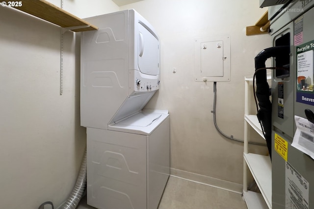 5312 SW Erickson Ave, Beaverton, OR 97005 - washroom featuring stacked washer / dryer and electric panel