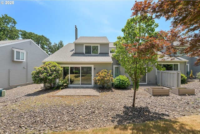 5312 SW Erickson Ave, Beaverton, OR 97005 - back of house with roof with shingles and a patio area
