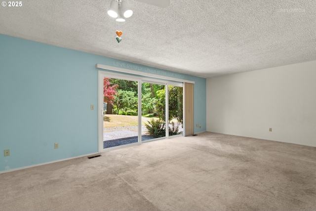 5312 SW Erickson Ave, Beaverton, OR 97005 - carpeted empty room featuring a textured ceiling