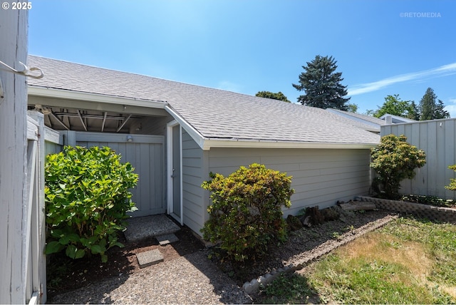 5312 SW Erickson Ave, Beaverton, OR 97005 - doorway to property featuring roof with shingles