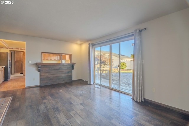 interior space with dark hardwood / wood-style flooring