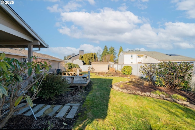 view of yard featuring a wooden deck