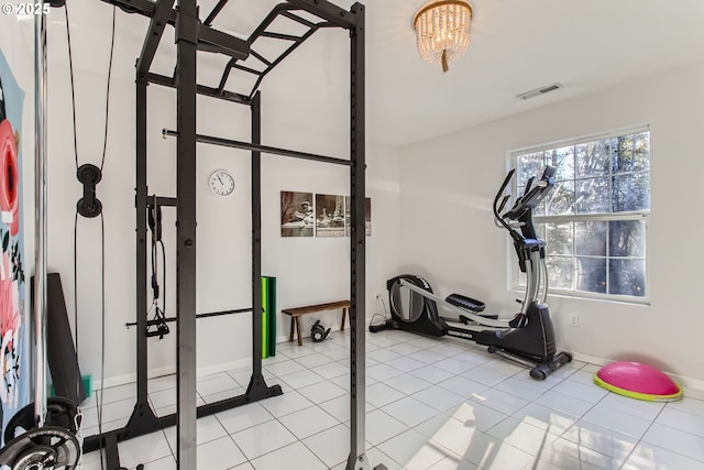 workout area with light tile patterned flooring