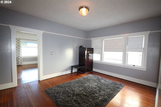 interior space with dark hardwood / wood-style flooring