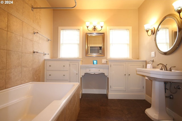 bathroom featuring tile patterned floors and tiled bath