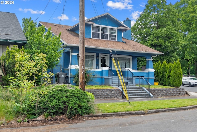 view of front of house with covered porch