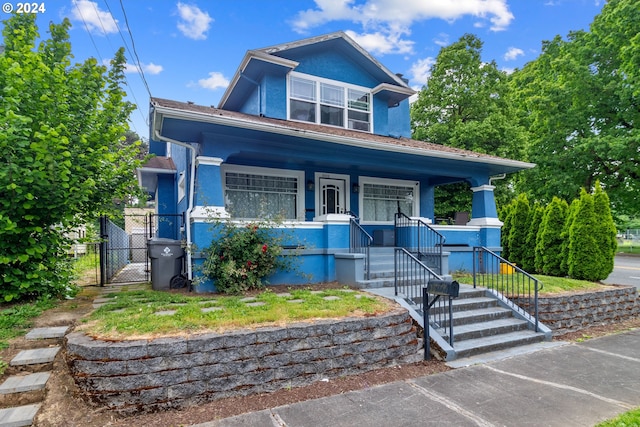 view of front of home featuring covered porch