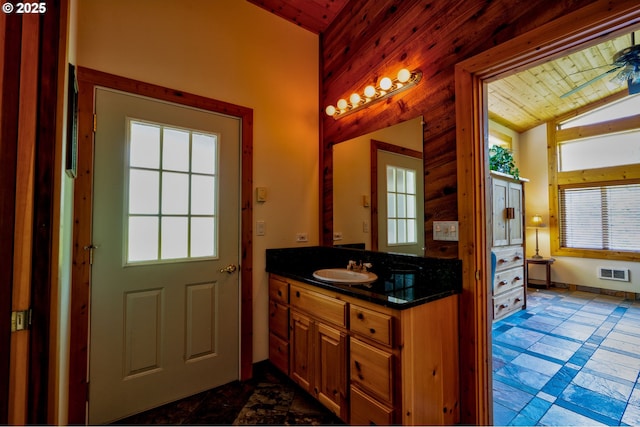 156 Peppermill Rd, Kelso, WA 98626 - bathroom with vaulted ceiling, wooden ceiling, vanity, healthy amount of natural light, and baseboards