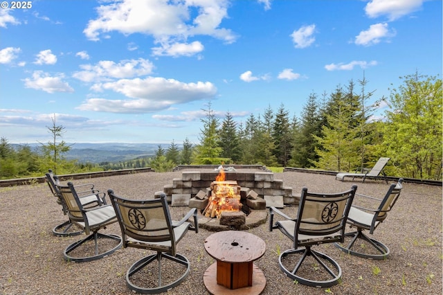 156 Peppermill Rd, Kelso, WA 98626 - view of patio featuring a fire pit and a mountain view