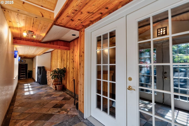 156 Peppermill Rd, Kelso, WA 98626 - hallway featuring wooden ceiling, dark stone finish floors, baseboards, and wood walls