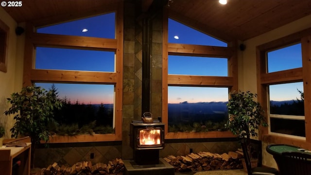 156 Peppermill Rd, Kelso, WA 98626 - sunroom / solarium with vaulted ceiling and a wood stove