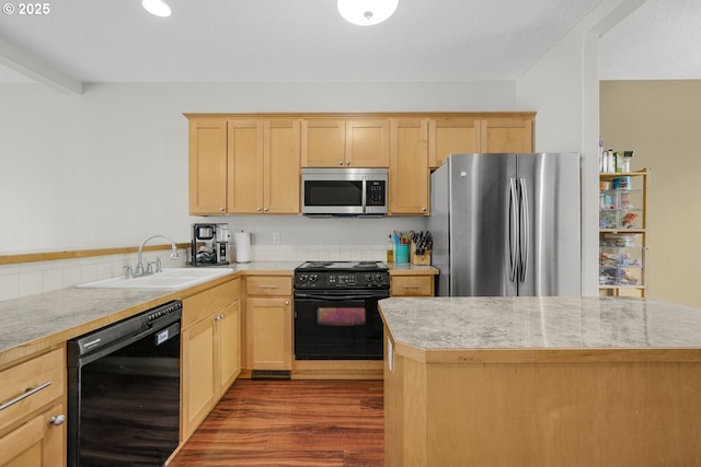 17364 SW Novato Ln, Beaverton, OR 97078 - kitchen with black appliances, a sink, light brown cabinetry, wood finished floors, and light countertops