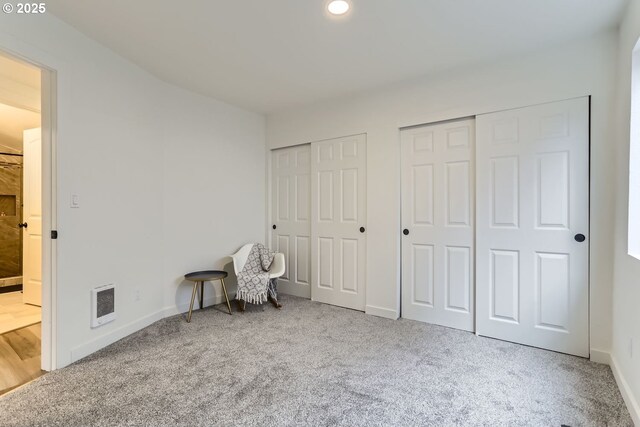 3154 NE 80th Ave, Portland, OR 97213 - unfurnished bedroom with multiple closets, carpet flooring, and recessed lighting