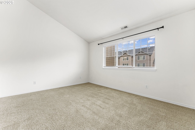 9234 SW Cascara Ln, Tualatin, OR 97062 - carpeted empty room featuring vaulted ceiling and baseboards