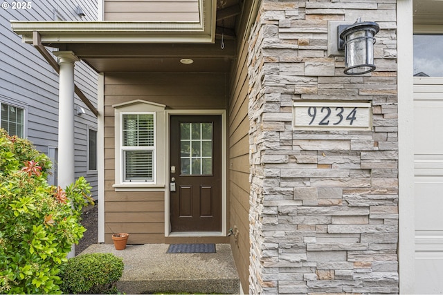 9234 SW Cascara Ln, Tualatin, OR 97062 - property entrance featuring stone siding