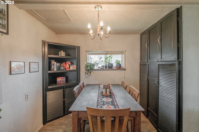 2440 Porter St, Lebanon, OR 97355 - dining room featuring wood finished floors and a chandelier