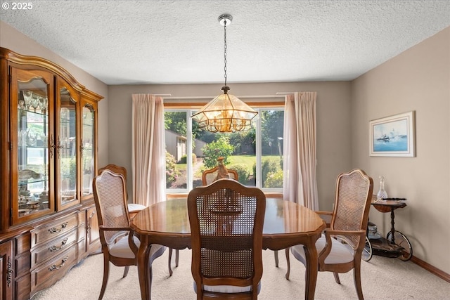 601 NW 110th Way, Vancouver, WA 98685 - dining room with a chandelier, light carpet, and a textured ceiling