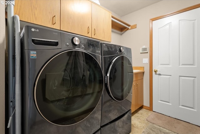 601 NW 110th Way, Vancouver, WA 98685 - laundry area featuring washer and clothes dryer and cabinet space