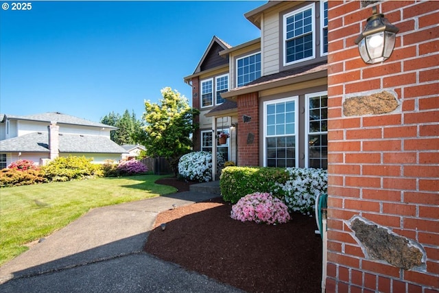 601 NW 110th Way, Vancouver, WA 98685 - entrance to property featuring a lawn and brick siding