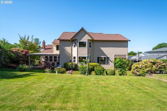 601 NW 110th Way, Vancouver, WA 98685 - rear view of property featuring a yard and a chimney