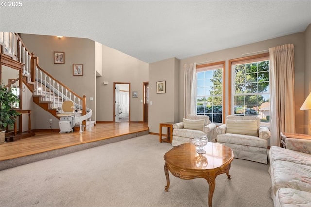 601 NW 110th Way, Vancouver, WA 98685 - living room featuring carpet, stairway, and high vaulted ceiling