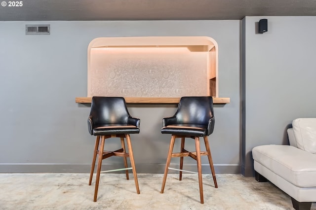 1834 SE 20th Ave, Portland, OR 97214 - dining room featuring unfinished concrete floors and a dry bar