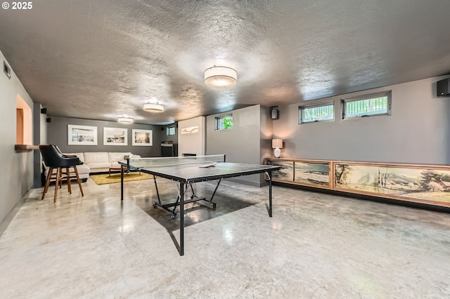 1834 SE 20th Ave, Portland, OR 97214 - rec room featuring concrete flooring and a textured ceiling