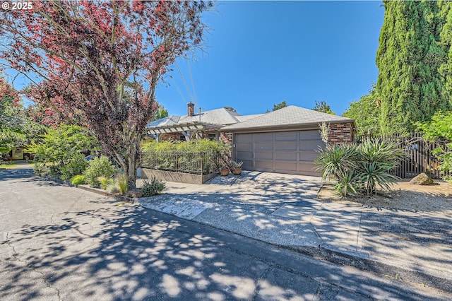 1834 SE 20th Ave, Portland, OR 97214 - view of front facade with driveway, a garage, and a chimney