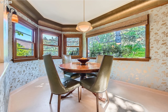 1834 SE 20th Ave, Portland, OR 97214 - dining space with wallpapered walls, plenty of natural light, and crown molding