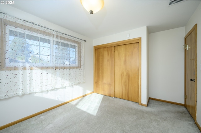 1736 NE Hembree St, Mcminnville, OR 97128 - unfurnished bedroom featuring carpet flooring, baseboards, and a closet