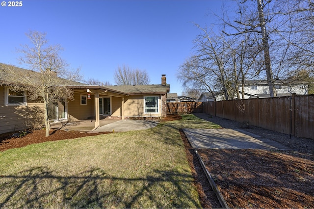 1736 NE Hembree St, Mcminnville, OR 97128 - rear view of house featuring a chimney and a patio