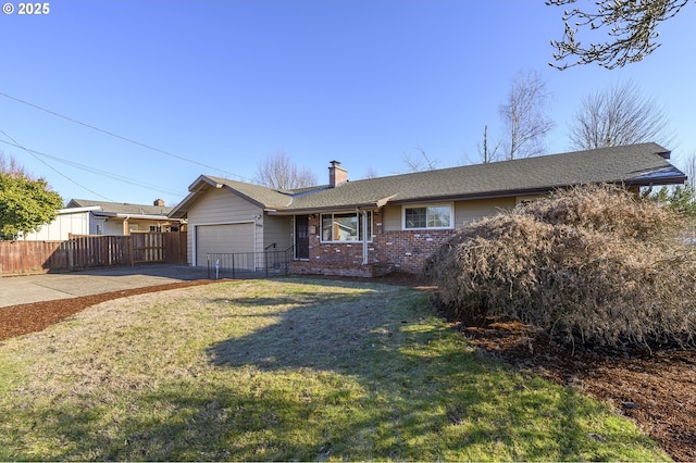 ranch-style home with a garage and a front yard